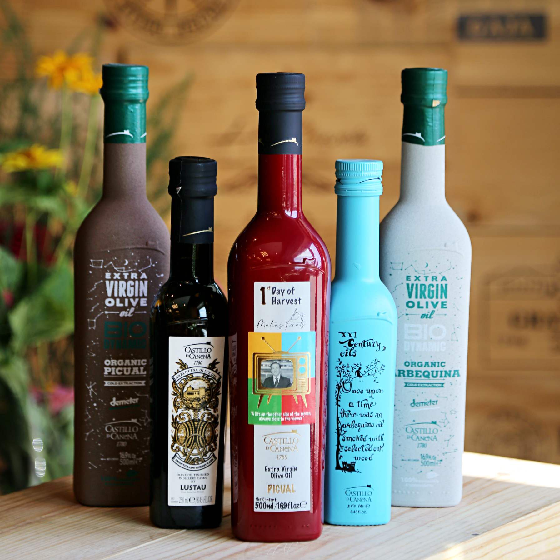Castillo de Canena rūkyto alyvuogių aliejaus buteliai